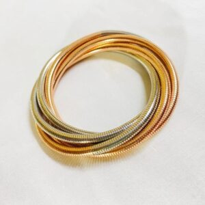 Home gold multi tone coil bangle