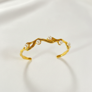 18k gold plated organic wave pearl bangle.