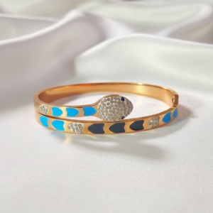 the serpentine elegance: gold tone enamel & crystal snake bangle
